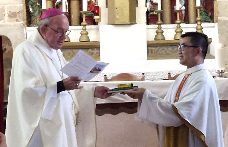 Fr Savio accepts the blessed oil Mullewa2