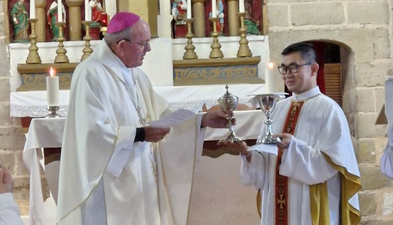 Fr Savio accepting the symbols of the Eucharist which he will celebrate faithfully. Mullewa3